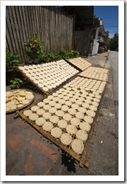 Rice cakes drying in the midday sun