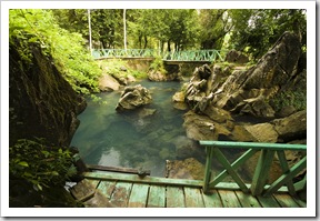 The spring-fed swimming hole outside Thamchang Cave