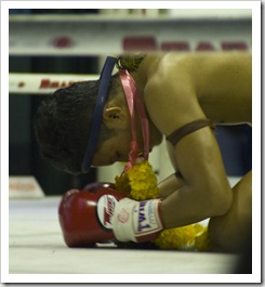 The ceremonies before each fight (this is the reigning Lightweight Champion of Thailand)