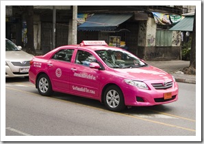 A typical pink taxi in Bangkok