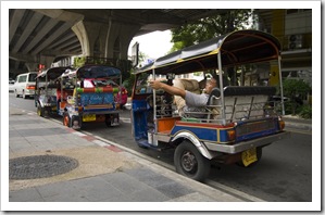 Tuk-tuks line up near King Rama VIII Bridge