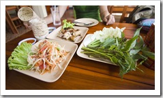 Typical lunch fare for us whilst on Phuket: spicy papaya salad, BBQ chicken, sticky rice and fresh greens