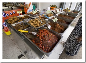 Some spicy-looking food at one of the stalls lining the streets in the old section of Phuket Town