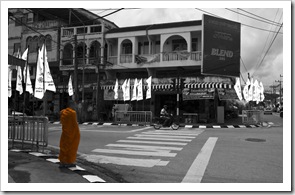 A monk walking the streets of Phuket Town