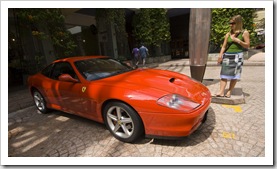 Lots of nice cars in Singapore: Lisa next to a Ferrari 575M Maranello