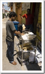 Making naan bread on the streets of Little India