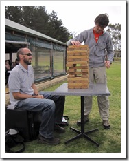 Sam and Sergey playing the huge Jenga at Bootleg Brewing Company