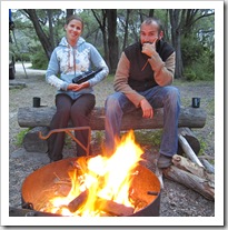 Sam and Lisa by the fire at Conto Campground