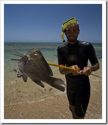 Sam catches Lisa a Yellowfin Bream for dinner on Ningaloo Station