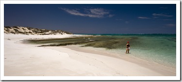 Lisa in the water on a secluded beach at Five Finger Reef