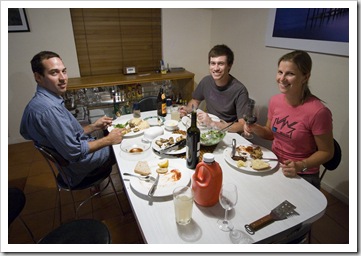 Cal, Sam and Lisa sitting down for dinner