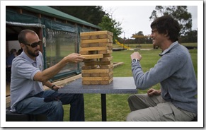 Sam and Sergey playing the huge Jenga at Bootleg Brewing Company