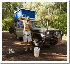 Taking a much needed hot shower in Warren National Park