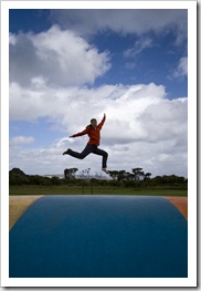 Lisa enjoying the air-filled trampoline at Ocean Beach