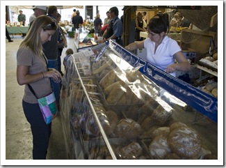 Lisa purchasing some of the awesome fresh bread on offer at the Boat Shed Markets