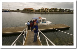 Lisa walking to the boat for a tour of some of the Port Lincoln fish farms