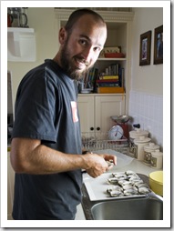 Sam shucking oysters on the Brown's farm