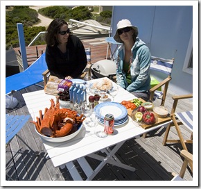 Lisa and Gina with a mountain of crayfish