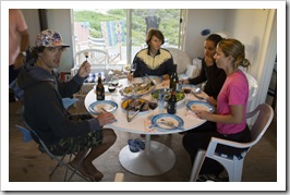 Chris, Cathy, Gina and Lisa admiring the dinner spread