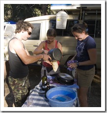 Chris, Lisa and Gina attacking the dishes at Smith Mill campsite