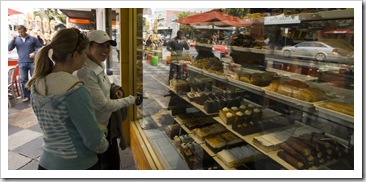 Lisa and Bronte admiring one of the many cake shops in Saint Kilda