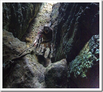 Greg entering the cave at Seal Rocks