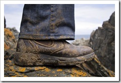 Muddy boots after a trip to the Seal Rocks cave