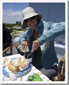 Lisa with a mountain of fresh crayfish