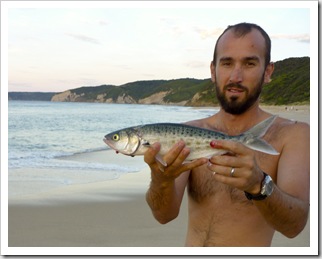 Sam with an early morning Salmon Trout at Johanna Beach