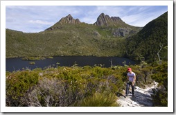 Lisa hiking around Dove Lake with Cradle Mountain in the background