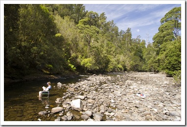 Carol relaxing in the Hellyer River next to our Hellyer Gorge campsite