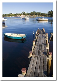 Fishing boats in the morning light in Strahan