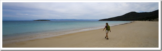 Lisa walking along Hazards Beach on our hike back from Wineglass Bay