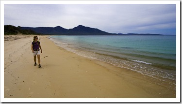 Lisa walking along Hazards Beach on our hike back from Wineglass Bay