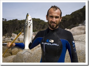 Sam catching Yelloweye Mullet for everyone's dinner at Bay of Fires