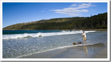 Sam fishing for Salmon Trout at Fortescue Bay