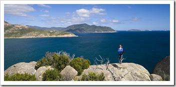 Lisa at Pillar Point with some of the Wilsons Promontory islands in the distance