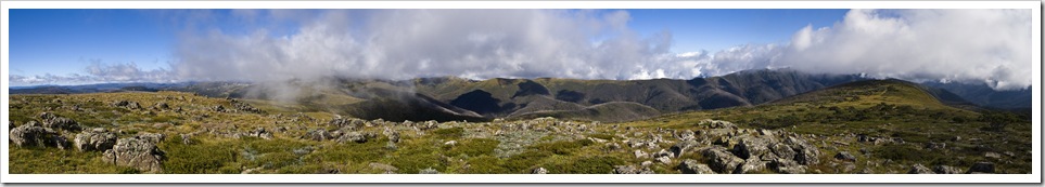 Panoramic of the Razorback Trail with Mount Feathertop in the clouds to the right