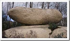 Lisa holding up one of the boulders near the Old Galleries Walk