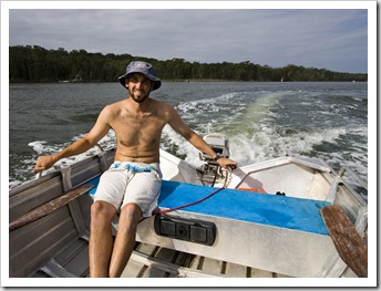 Sam piloting the dinghy around Lake Conjola