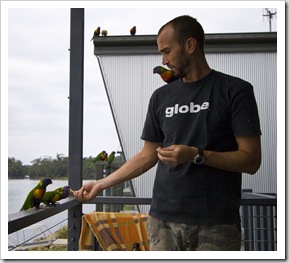 Sam and some friendly Rainbow Lorikeets at Lake Conjola