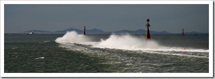 Powerboat water trails as they tear through the bay in Newcastle