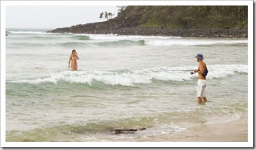 Sam fishing with Lisa in the surf at Tea Tree