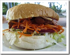 Chris' first burger with the lot at Rainbow Beach