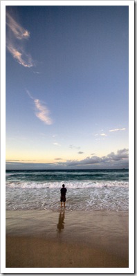 Matt fishing in the surf in front of our house