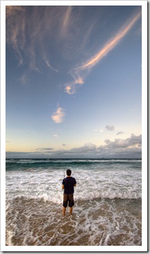 Matt fishing in the surf in front of our house