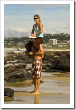 Lisa hitching a ride on Coolum Beach