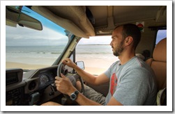 Sam driving along the sand on Fraser Island