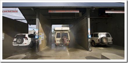 Peter, The Tank and Bessie getting an underbody wash in Rainbow Beach