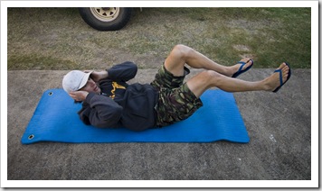 Chris doing his morning stretches in Bundaberg